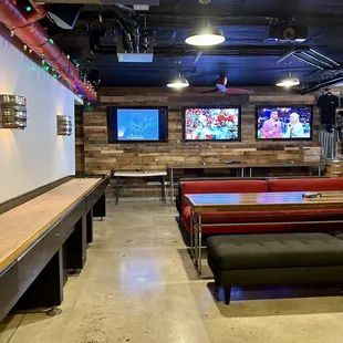 a row of booths and tables