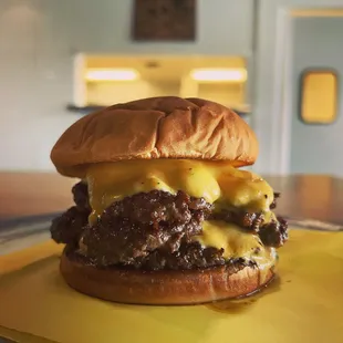 The Doug... triple cheese burger..with whatever you want.