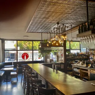a bar with lots of bottles of wine