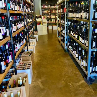 rows of wine bottles on shelves