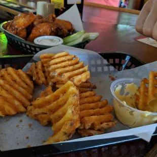 a tray of fries and dips