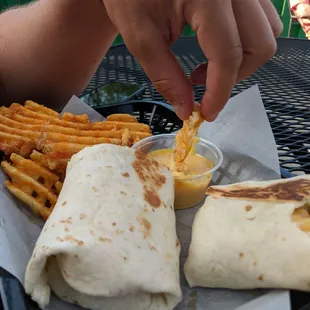a burrito and fries