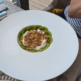 The yogurt with pecans and kiwi looked so appetizing.