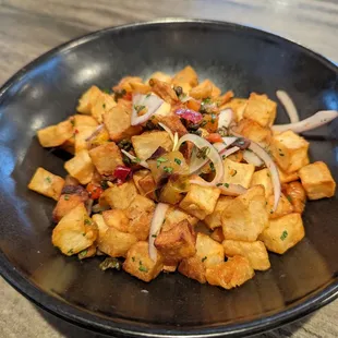 These crunchy country potatoes were served with red onions, peppers, and crème fraîche. It was first rate.