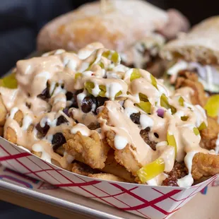 a tray of fried chicken sandwiches