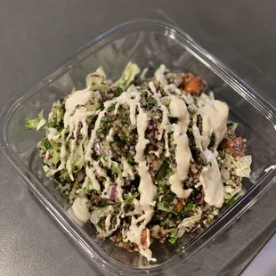 a salad in a plastic container