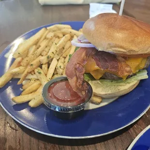 Crown Jewel Hamburger Grilled 7oz burger topped with cheese, bacon, mayo, ketchup, lettuce, tomato and onion.