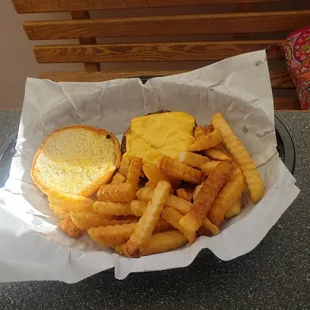 a basket of fries and a sandwich