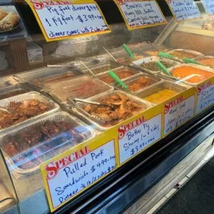 a variety of food items in a display case
