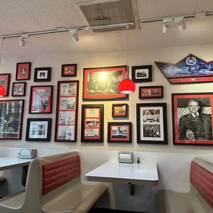 The wall of photos from the restaurant.