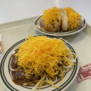 A Chili Spaghetti 6-Way and two Chili Cheese Sandwiches with garlic.
