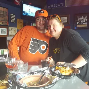 a man and woman posing for a picture