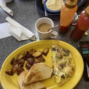 Veggie omelette with sourdough toast and potatoes