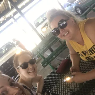 three women sitting at a table