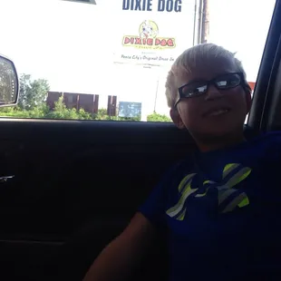 a boy in a car