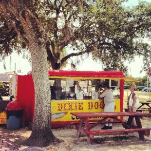 a red and yellow food truck