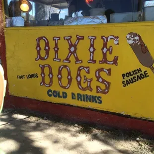 a woman standing in front of a store