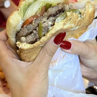 The Philly cheeseburger. She took a bite before I got the picture, but she could t help it. It smelled good and she was drooling