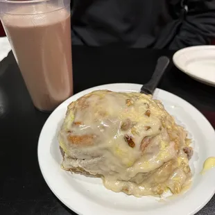 Giant cinnamon roll and large chocolate milk! Yum