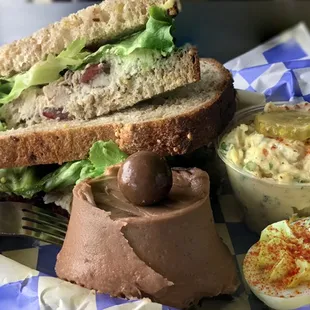 Nutty Chicken Salad box lunch with yukon gold potato salad, chocolate malt Upcake, and deviled egg.