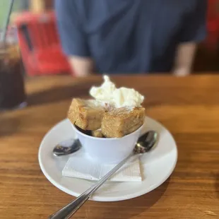 a cup of ice cream and a spoon