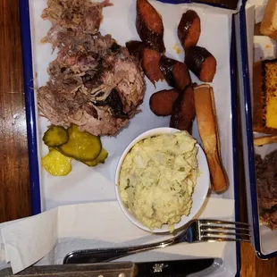 Meat plate (sausage and pulled pork) with potato salad