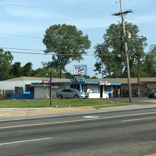 a car parked in front of a motel