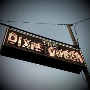 a neon sign for dixie queen