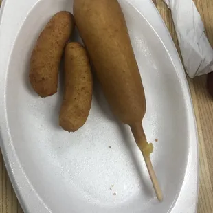 Kids corn dog, it comes with two side. My son got mac &amp; cheese, and a fruit cup.