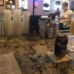 a woman sitting at the bar
