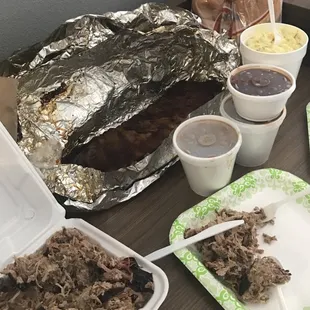 Family Deal: 2 lbs of bbq, pkg of buns, &amp; 4 qts of sides. Plus, a rack of ribs!