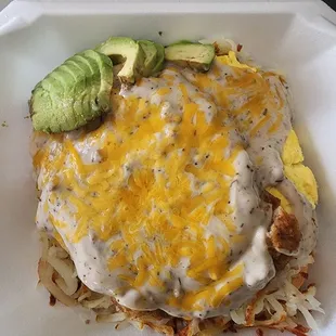  a cheeseburger in a styrofoam container