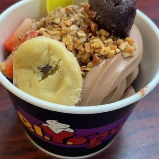 a bowl of yogurt with fruit and nuts