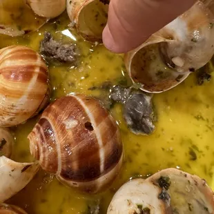 Escargot mush. Escargot are supposed to be solid and chewy. These were so nasty and stinky. They&apos;re gonna k***somebody.