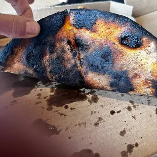 Charred crust.  It tasted terrible.