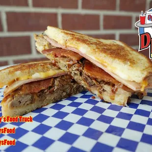 Colby-Jack Cheese, Smoked Pulled Pork, Grilled Ham, Crispy Bacon, Home-Made BBQ Sauce