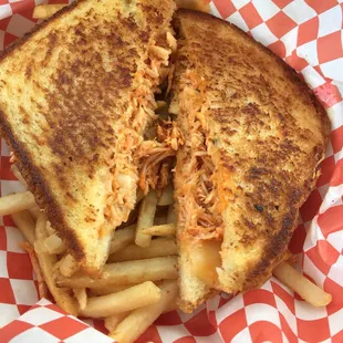 Mother clucker sandwich had white meat chicken with buffalo sauce, and pepper jack cheese.