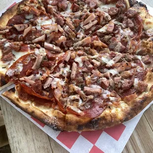 The Harry Hines (if you are a meat-lover, this is the pizza for you!).