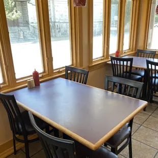 a table and chairs in a restaurant