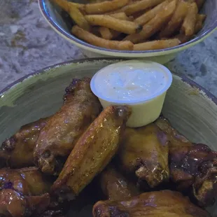 Dizzy's Wings (Hot Honey) w/ ranch and a side of fries.