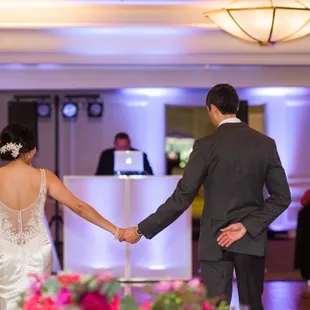 DJ Cee preparing for our first dance. Best day ever!