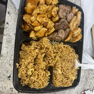 Hibatchi chicken, steak and shrimp with fried rice