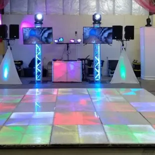 Dj setup, lights, sound, screens, &amp; led lit dancefloor