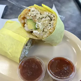 a burrito with a side of ketchup