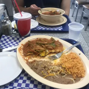 Huevos rancheros and menudo plate
