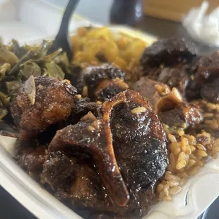 Oxtails greens and chick pea potatoes