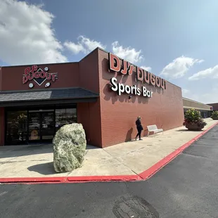 the entrance to a sports bar