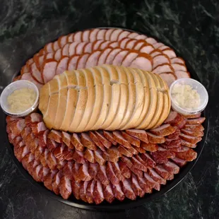 Kielbasa platter with rye bread.