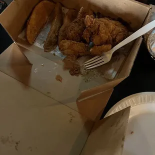 Fried chicken and potato wedges.
