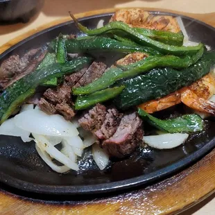 Shrimp and Beef Fajitas with Poblanos and Onions